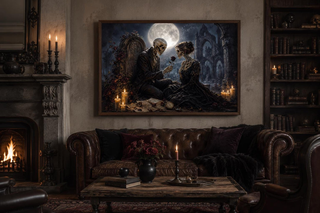 Gothic skeleton couple art canvas hanging in a dark academia living room with a fireplace.