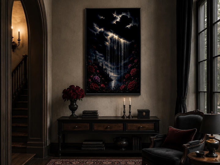 Gothic wall art canvas of a crying cloud over a castle with red roses in a moody room setting.