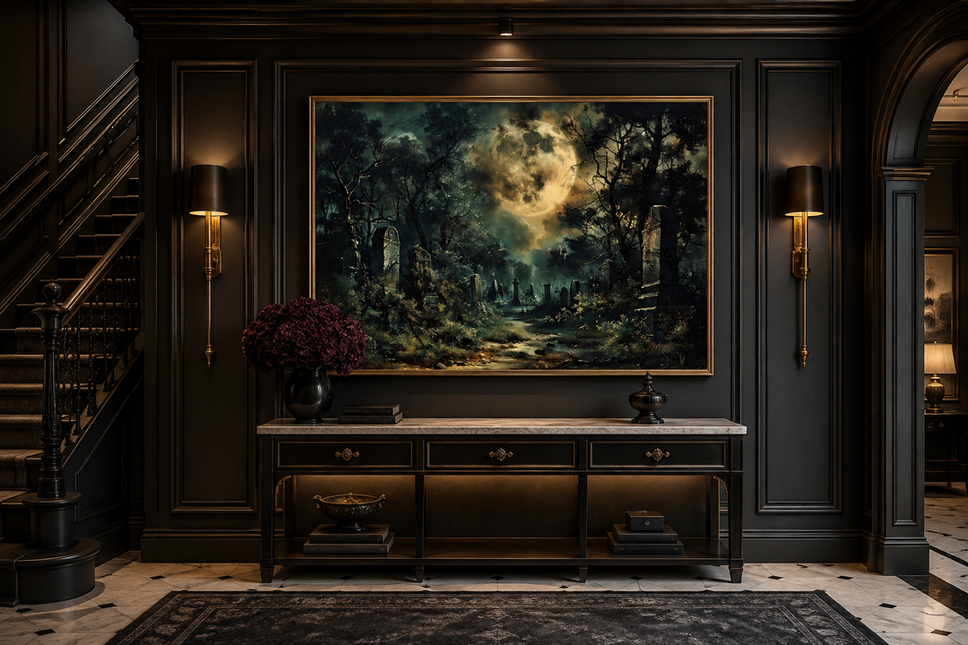 Framed canvas wall art of a haunted cemetery under a large full moon in a dark, gothic hallway.