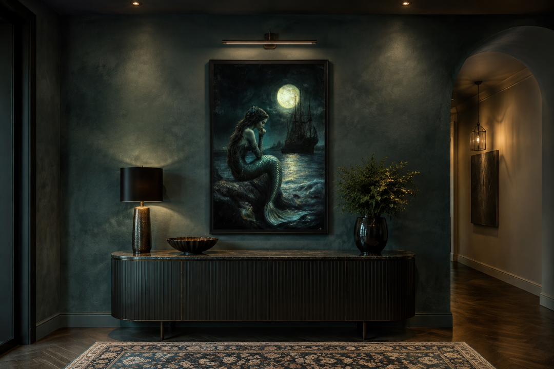 Gothic mermaid wall art above a dark sideboard, featuring a full moon and pirate ship scene.