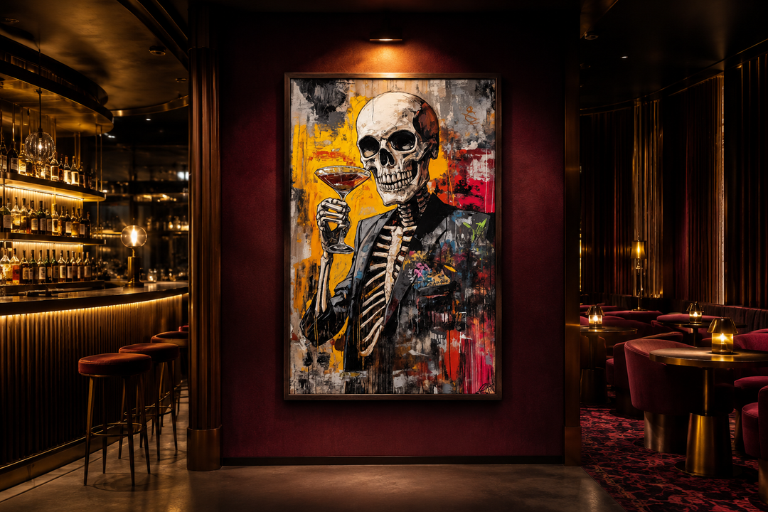 Graffiti skeleton skull in a suit holding a martini glass, framed canvas wall art in a bar setting.