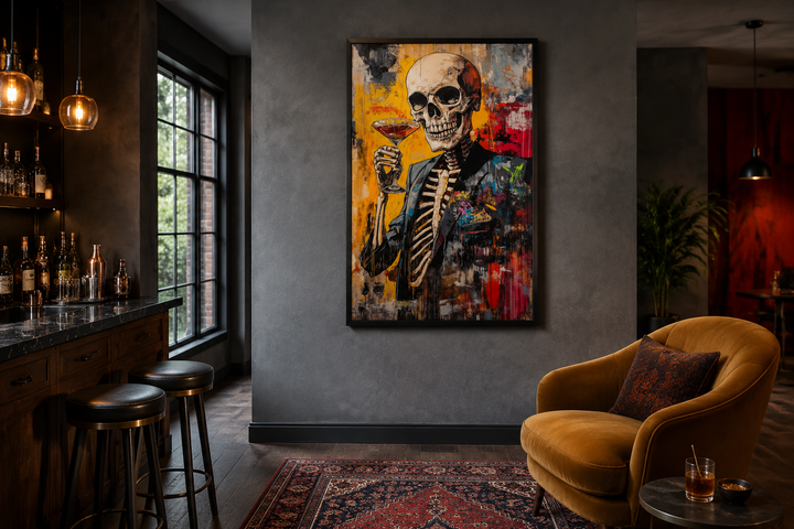 Graffiti skeleton skull with martini glass framed canvas wall art in a dark, modern lounge setting.