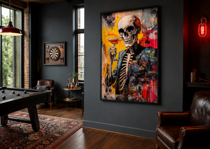 Graffiti skeleton skull with martini glass framed canvas wall art in a dark man cave setting.