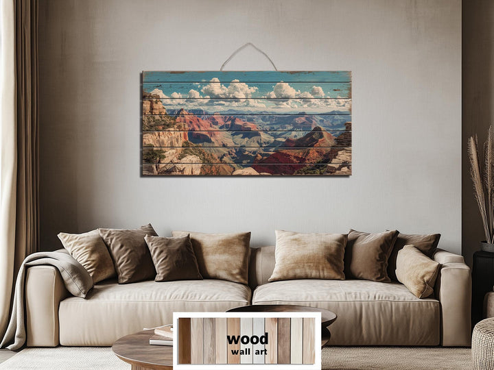 Grand Canyon landscape printed on horizontal distressed wood planks hanging above a neutral sofa.