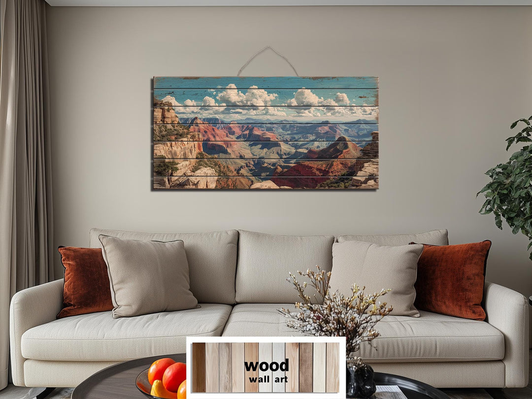 Grand Canyon landscape printed on horizontal distressed wood planks hanging above a neutral sofa.