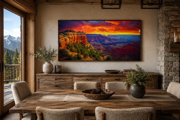 Framed Grand Canyon sunset canvas print with vibrant orange and red hues over a dining room buffet.