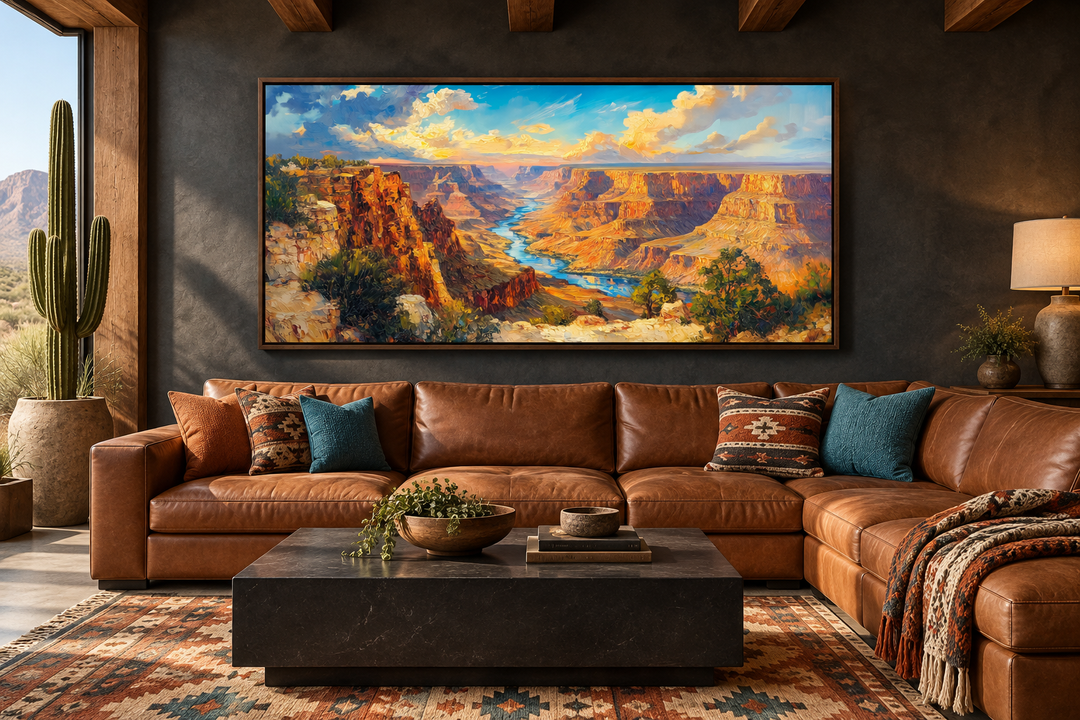 Extra large framed canvas wall art of a colorful Grand Canyon landscape above a brown leather sofa.