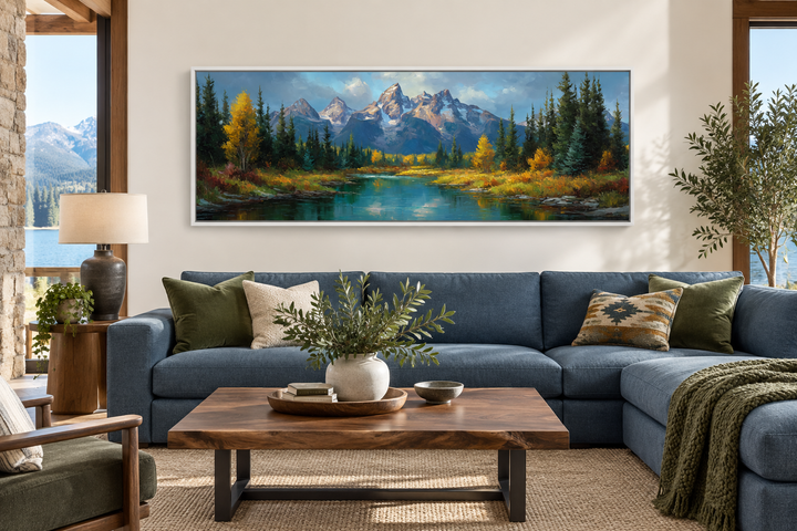 Grand Teton National Park long horizontal canvas wall art above a blue sofa in a rustic living room.