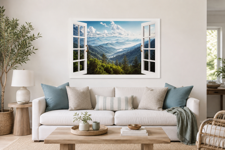 Great Smokey Mountains view from an open window painting on a white wall above a sofa.