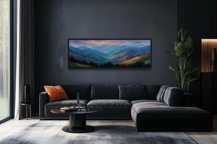 Great Smoky Mountains sunset panoramic canvas wall art above a black sofa in a modern living room.