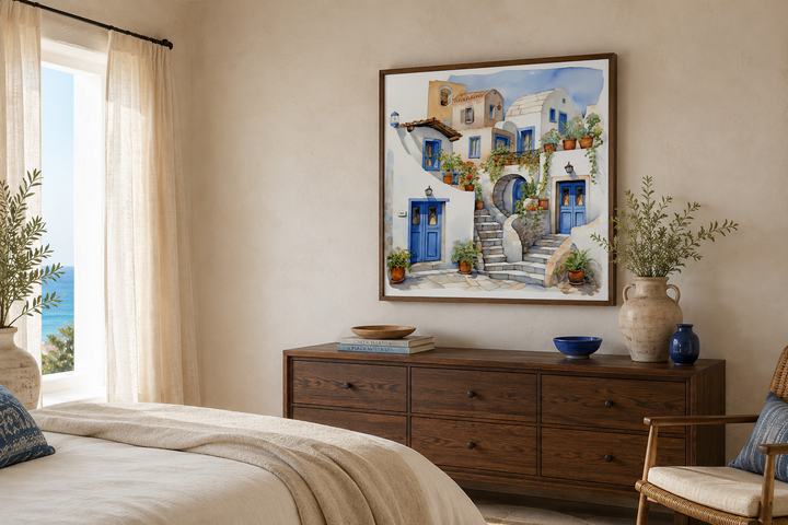 Greek Houses Santorini Greece framed watercolor canvas wall art above a dark wood dresser.