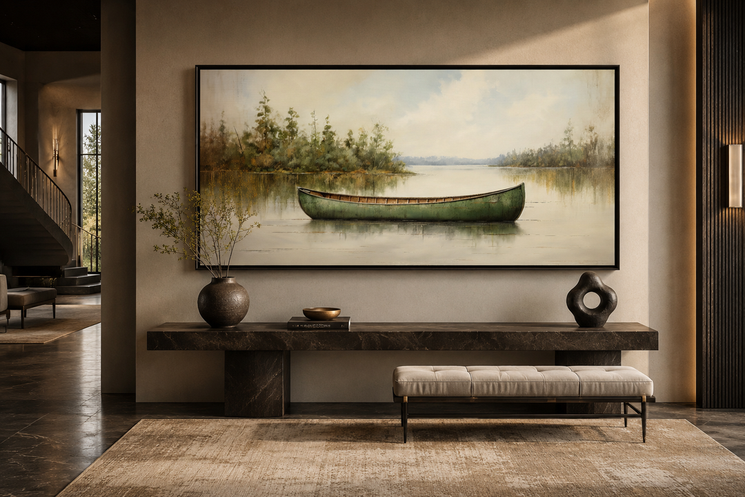 Framed green canoe painting on a calm lake, rustic wall art for cabin or lake house decor.