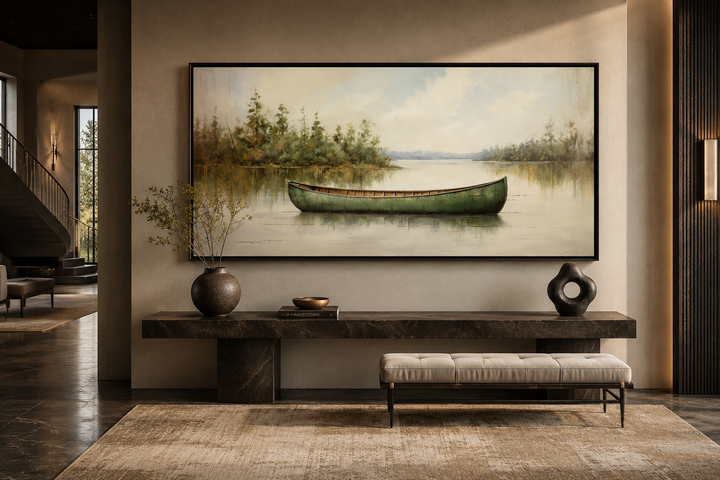 Framed green canoe painting on a calm lake, rustic wall art for cabin or lake house decor.