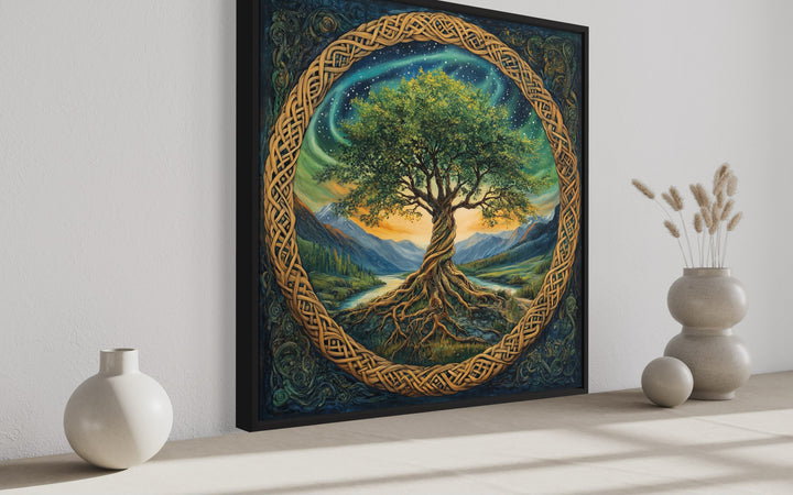 Green Celtic Tree of Life framed canvas wall art featuring intricate knots and a mountain landscape.