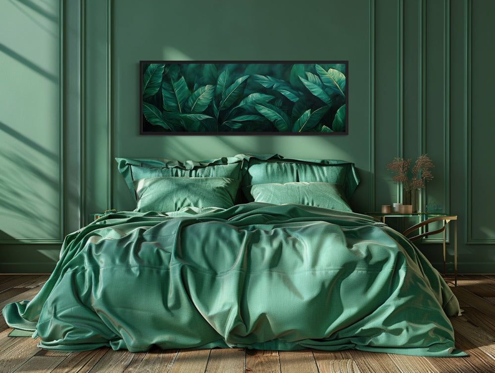 Green Tropical Leaves Long Narrow Horizontal Framed Canvas Wall Art above green bed