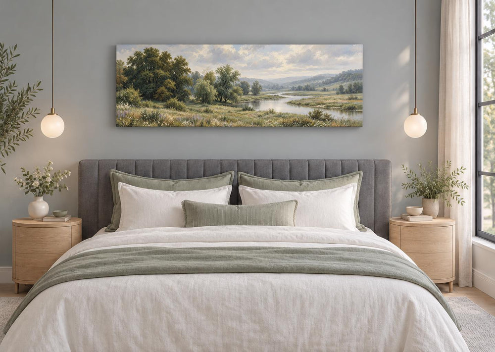 Green Valley and River Landscape long horizontal canvas wall art hanging above a bed in a bedroom.