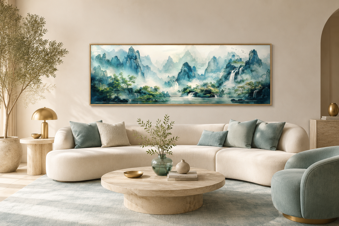 Green Shan Shui long narrow landscape canvas wall art above a cream sofa in a modern living room.