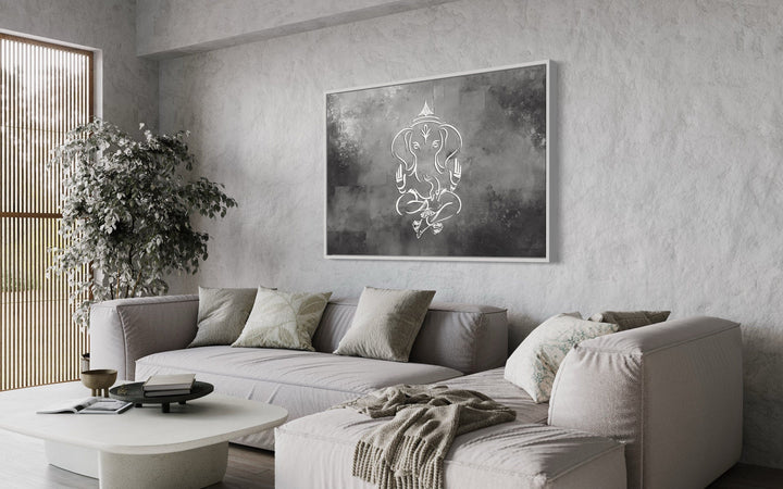 Grey Silver White Minimalist Lord Ganesh Framed Canvas Wall Art above couch in living room