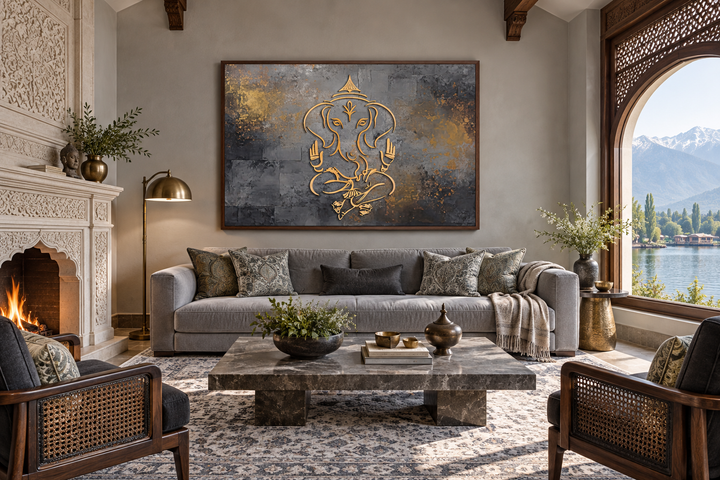 Minimalist grey and gold Lord Ganesh abstract painting in a walnut frame above a grey sofa.
