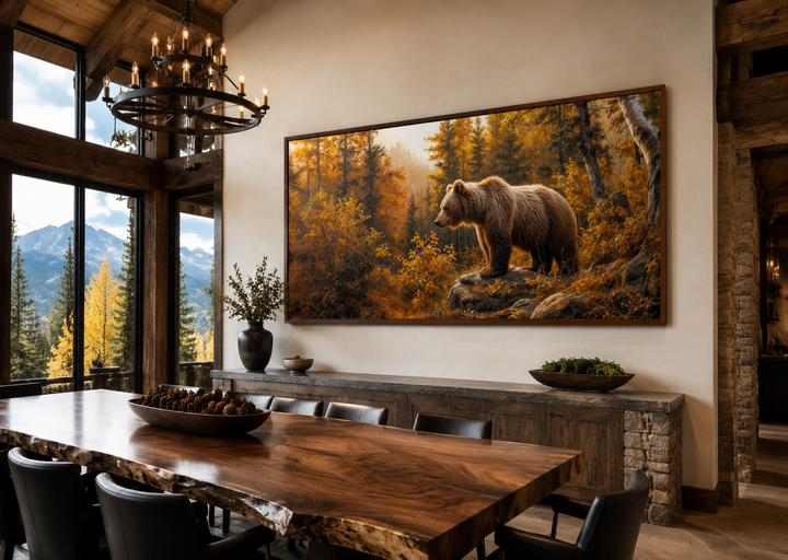 Grizzly bear in autumn forest canvas wall art hanging in a rustic dining room above a wooden buffet.
