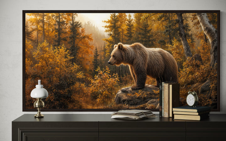 Grizzly bear in autumn forest canvas wall art displayed on a dark console table with rustic decor.