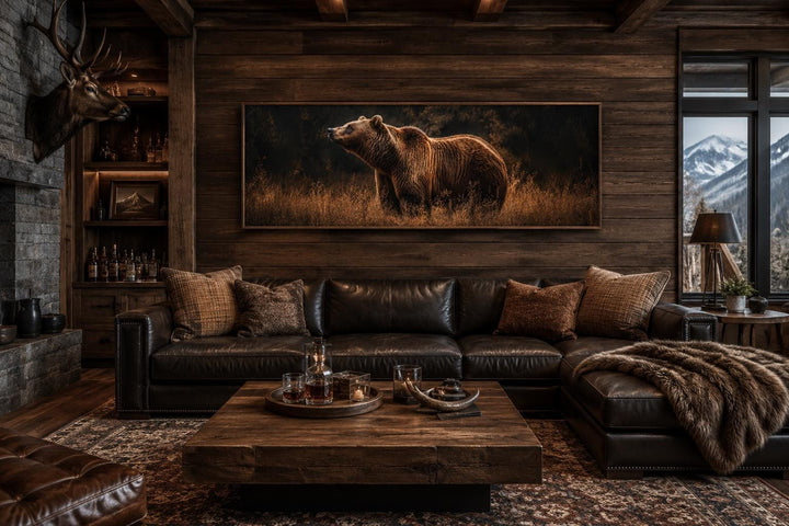 Grizzly bear standing in golden grass at dusk, long horizontal rustic brown cabin wall art.