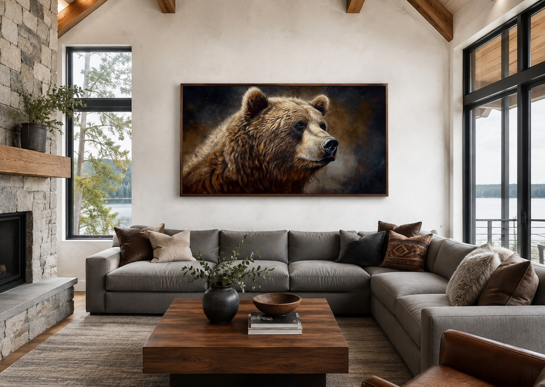 Extra large framed grizzly bear canvas art in a rustic lodge living room above a grey sectional.