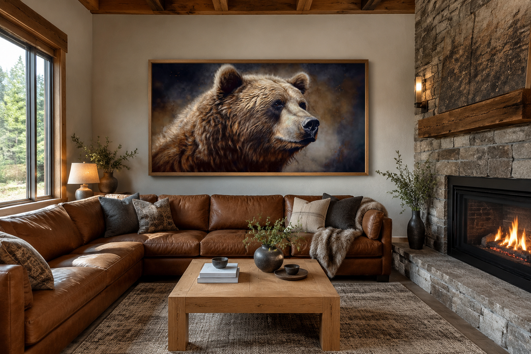 Extra large framed grizzly bear canvas wall art in a rustic living room above a leather sofa.