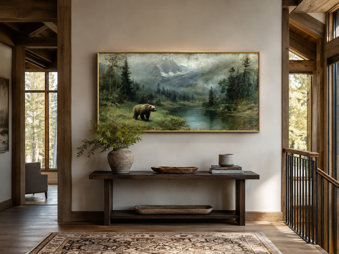 Grizzly bear on the lake rustic framed canvas wall art above a wooden console table in a cabin.