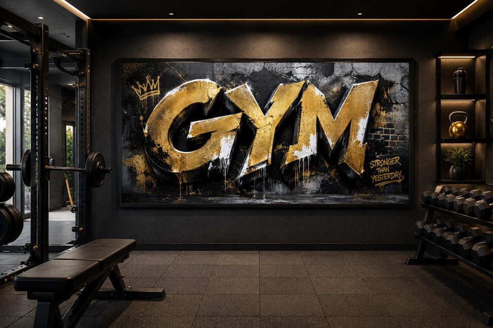 Gold graffiti Gym wall art with Stronger Than Yesterday text on a dark textured background.