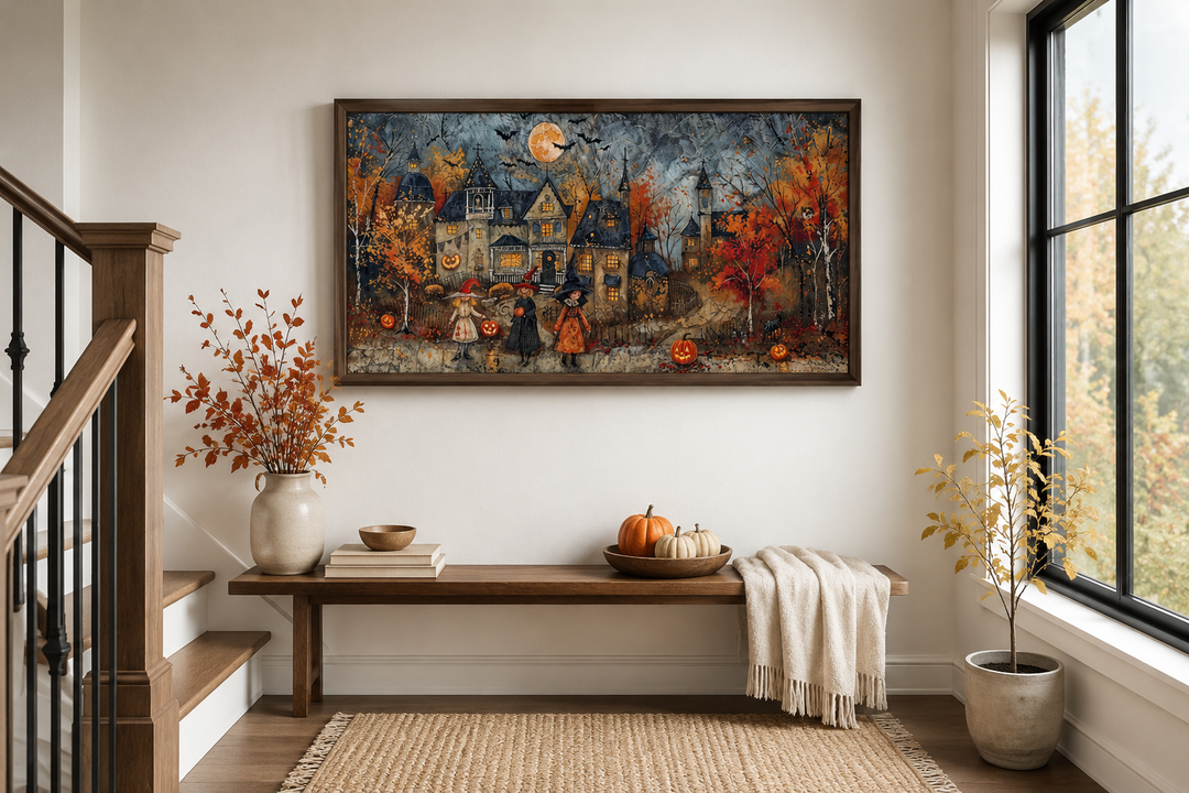 Framed Halloween canvas art of children trick-or-treating in a village above a wooden bench.