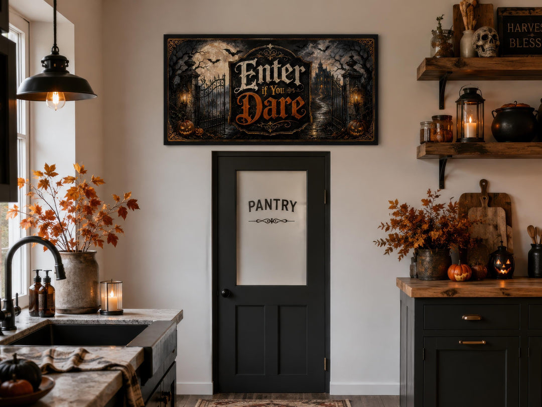 Enter If You Dare Halloween wall art canvas hanging above a black pantry door in a spooky kitchen.