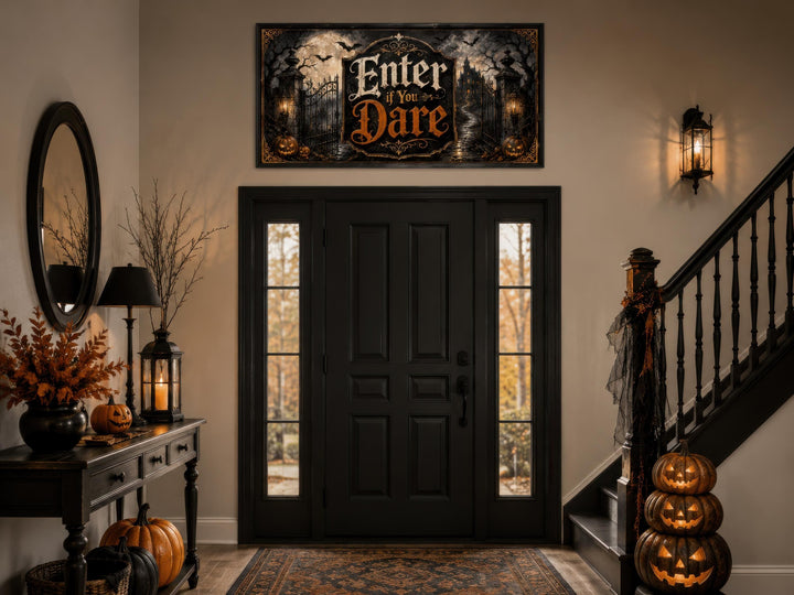 Enter If You Dare Halloween canvas print hanging above a black front door in a spooky entryway.