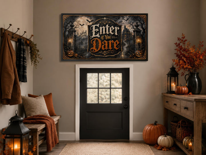 Enter If You Dare Halloween canvas wall art above a decorated entryway door with pumpkins.