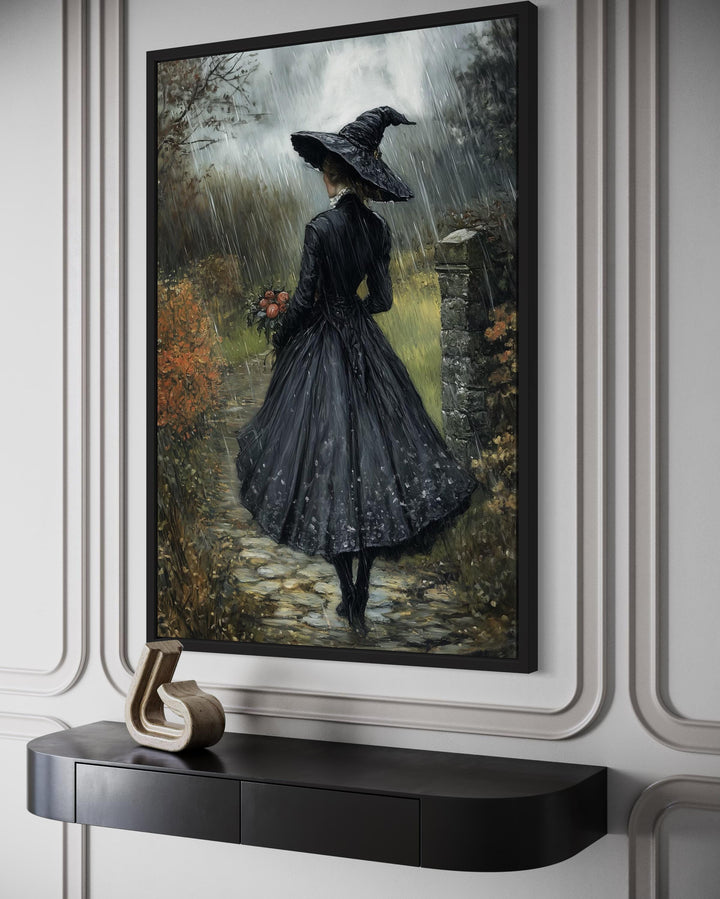 Halloween Witch in Black Hat Walking in Rain with Flowers Bouquet Wall Art