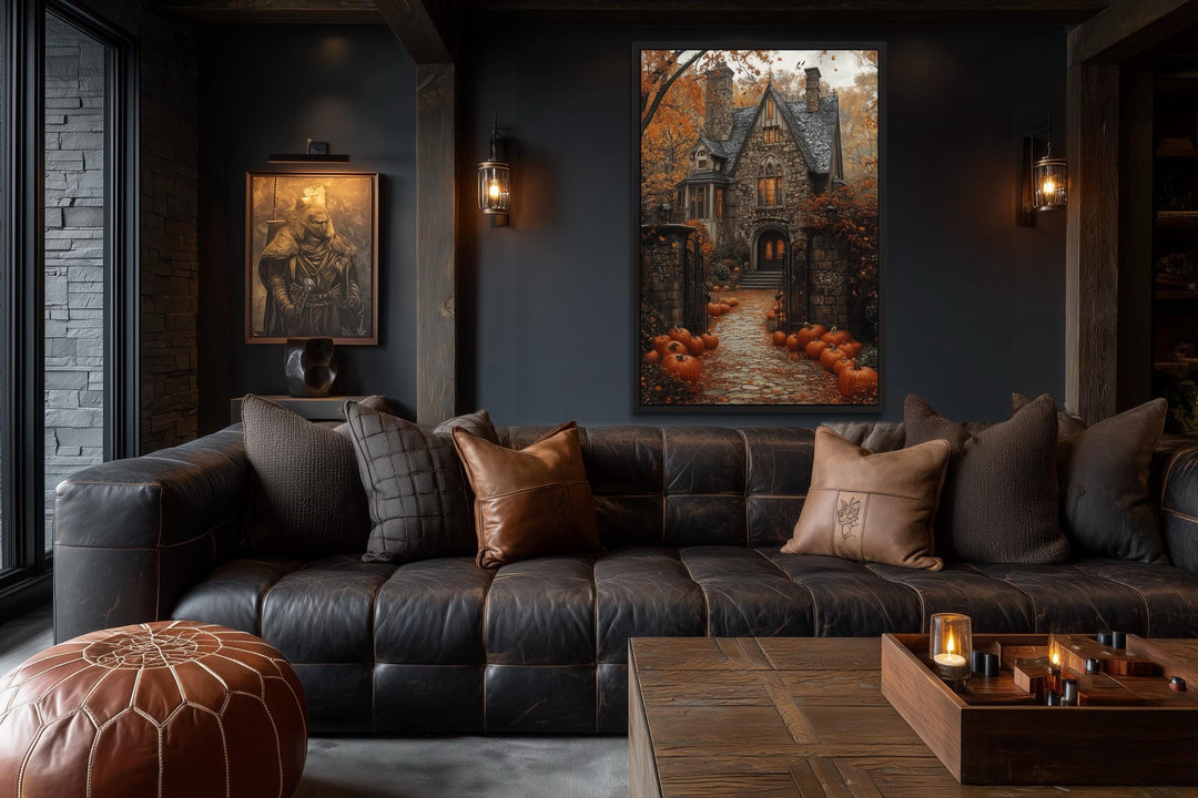 Haunted House and Pumpkin Path Halloween canvas art displayed in a dark, moody living room.