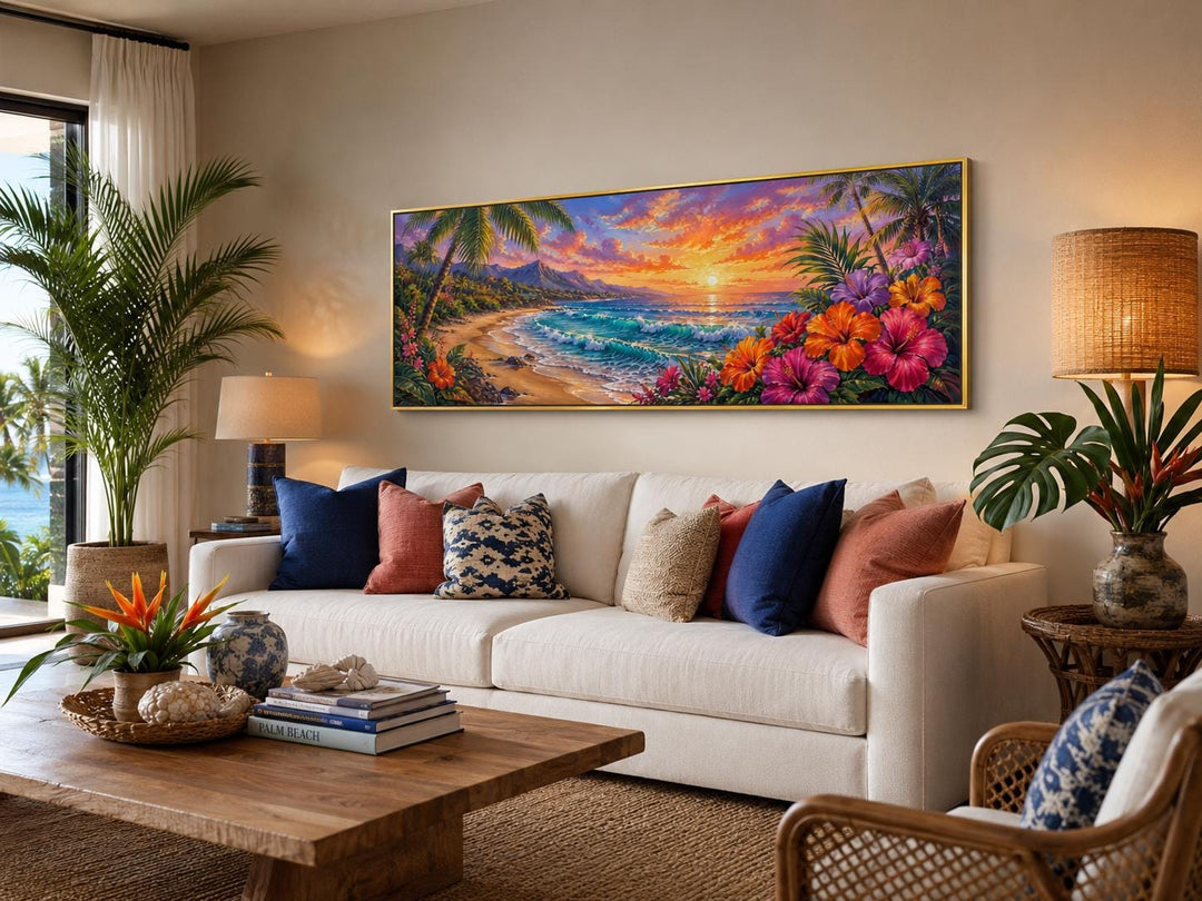 Vibrant Hawaiian beach sunset canvas print with tropical flowers above a sofa in a coastal room.