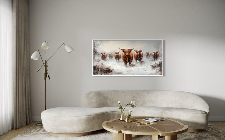 Herd Of Highland Cows In Snow Framed Canvas Wall Art