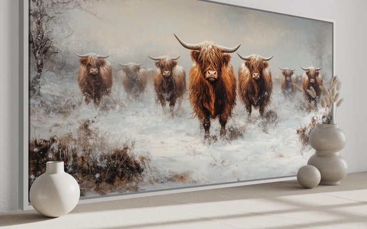 Herd Of Highland Cows In Snow Framed Canvas Wall Art