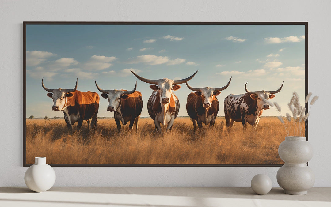 Herd of Texas Longhorns In The Field Framed Canvas Wall Art