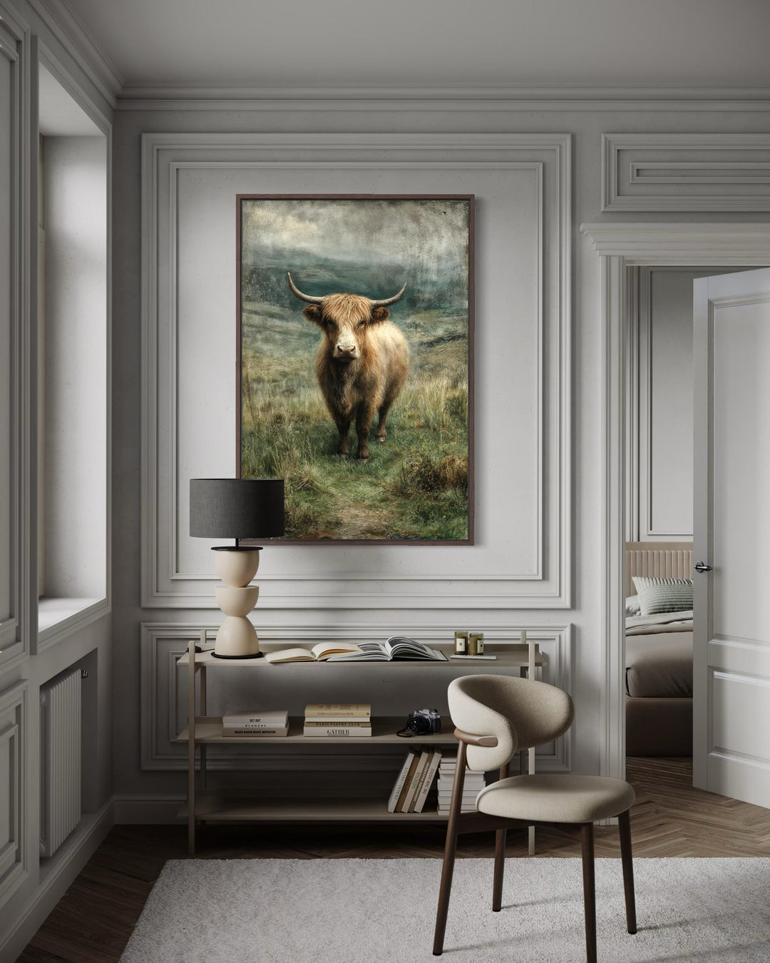 Vertical canvas wall art of a Highland cow in a green pasture, framed in a neutral room.