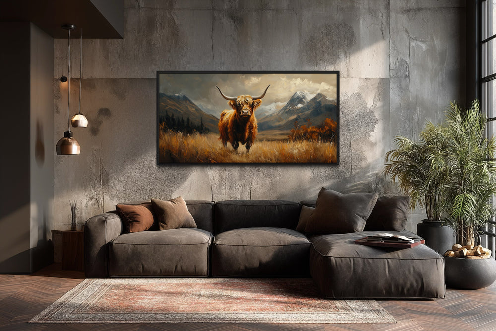 Framed canvas wall art of a highland cow in a brown landscape.