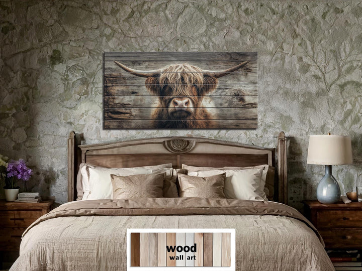 Large horizontal wood wall art featuring a rustic Highland cow portrait over a bed.