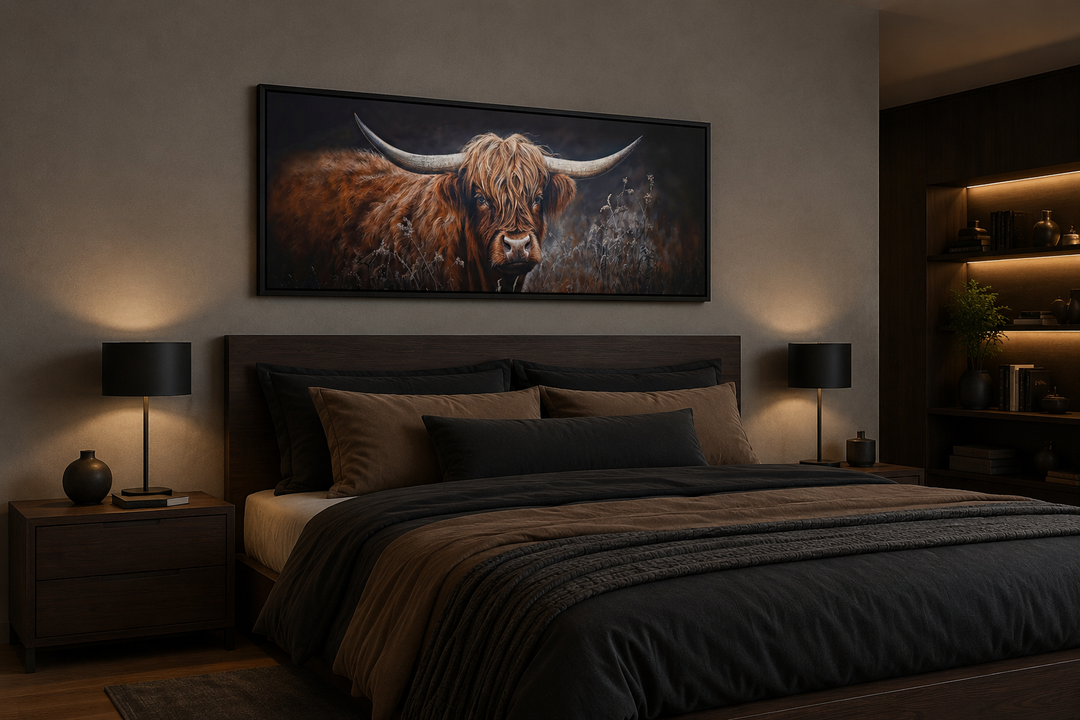 Dark Highland cow long horizontal canvas wall art hanging above a bed in a rustic bedroom.