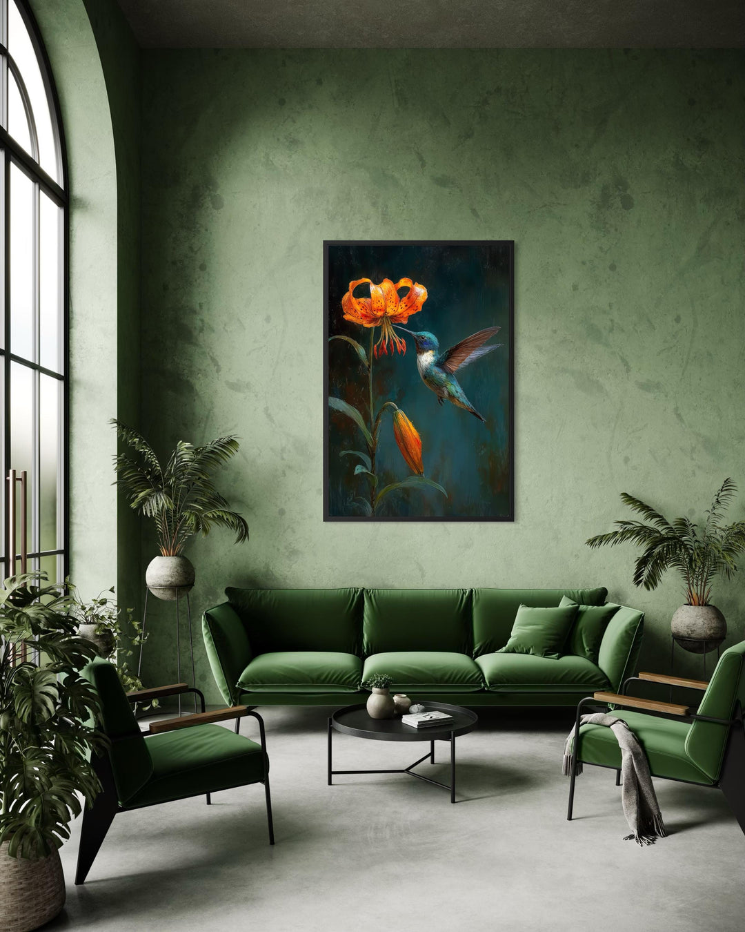 A framed canvas print of a hummingbird and orange lily hangs in a modern green living room.