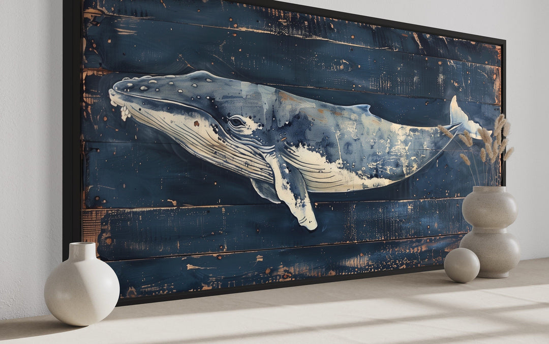 Humpback whale painting on navy blue distressed wood background, framed canvas wall art.