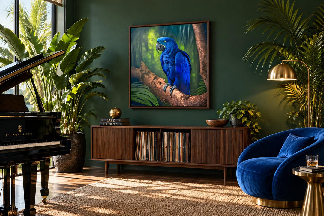Hyacinth Macaw Parrot Tropical Canvas Wall Art in a dark walnut frame above a wooden console.