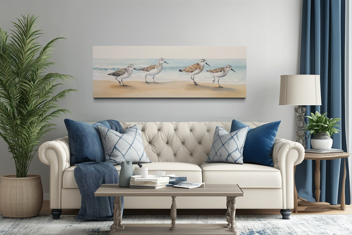 Toile encadrée horizontale représentant des bécasseaux marchant sur la plage