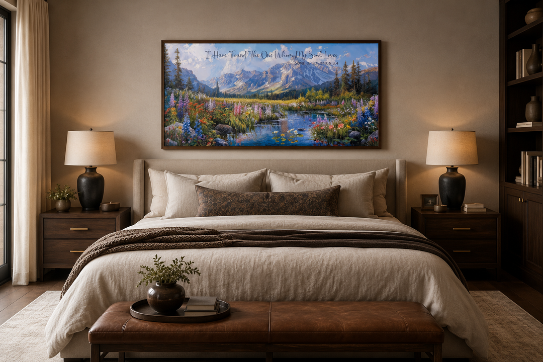 I Have Found The One Whom My Soul Loves scripture wall art on a mountain landscape above a bed.