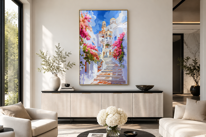 Ibiza Old Town watercolor wall art featuring a whitewashed street with vibrant pink flowers.